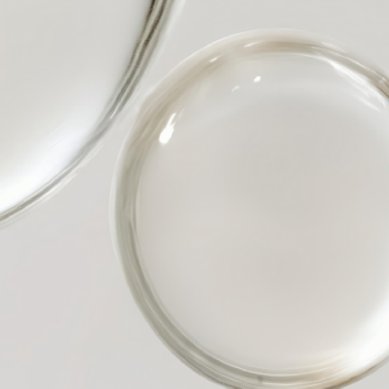 Close-up of Refine droplet from Vivian Valenty Skincare, representing hydration and nourishment for healthy, glowing skin.