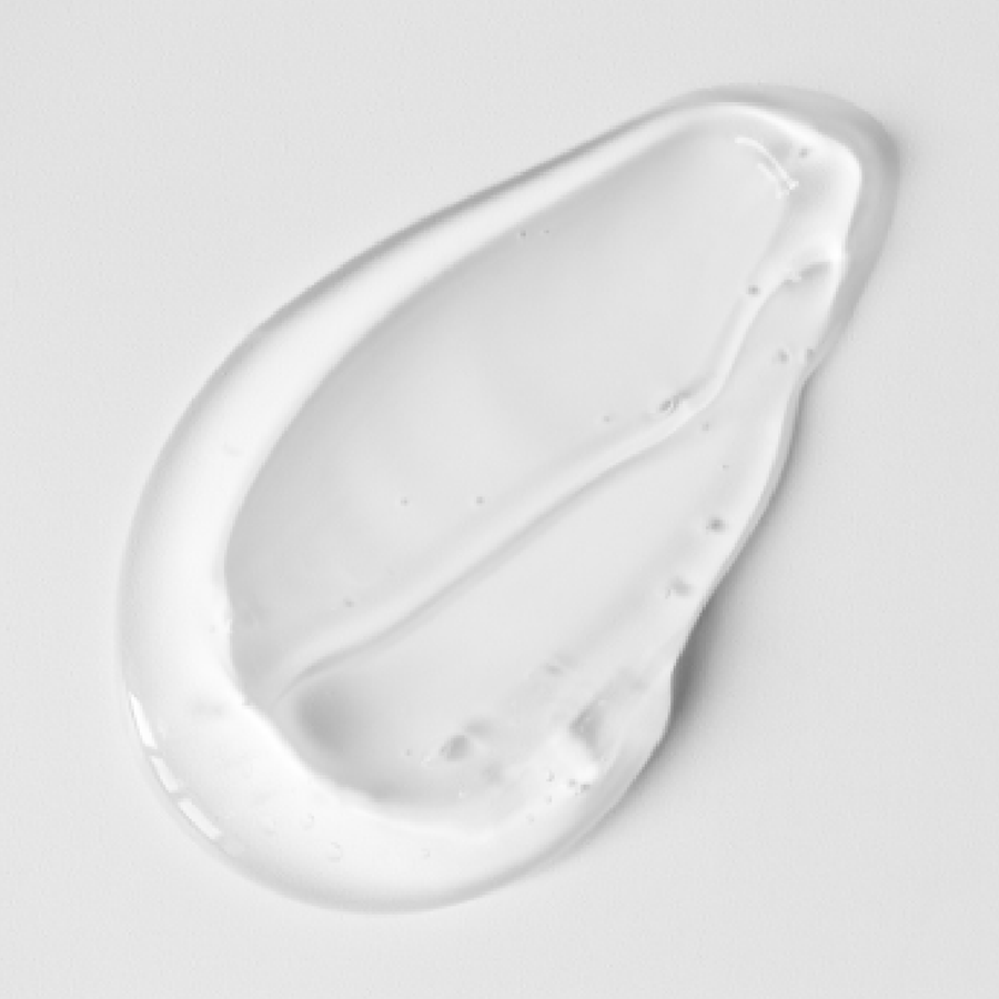 Close-up of a cleanser droplet from Vivian Valenty Skincare, representing hydration and nourishment for healthy, glowing skin.